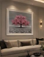 Pink cherry tree picture over sofa